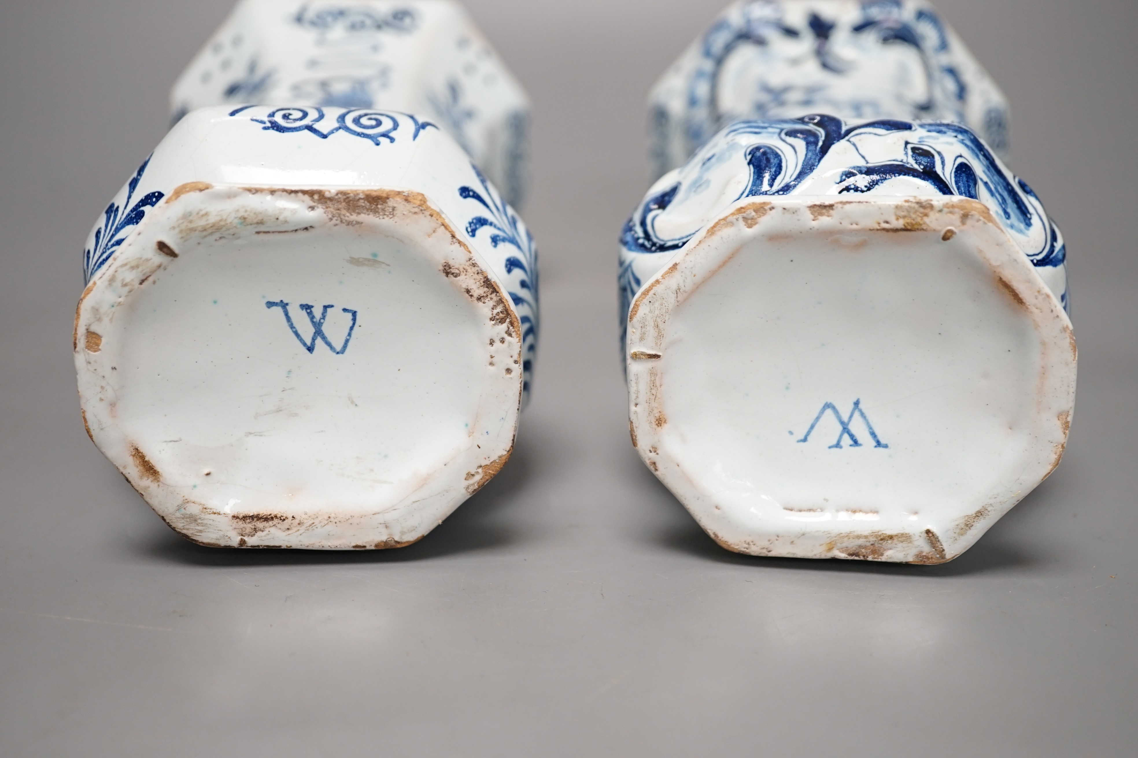 A pair of 19th century Delft blue and white vases 21.5cm